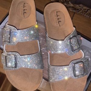 Brand new, never worn. Nicole Miller sandles